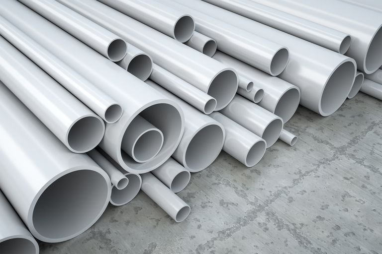 Several gray PVC pipe