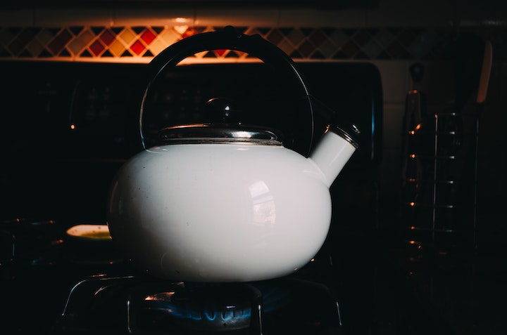 white kettle in a fire