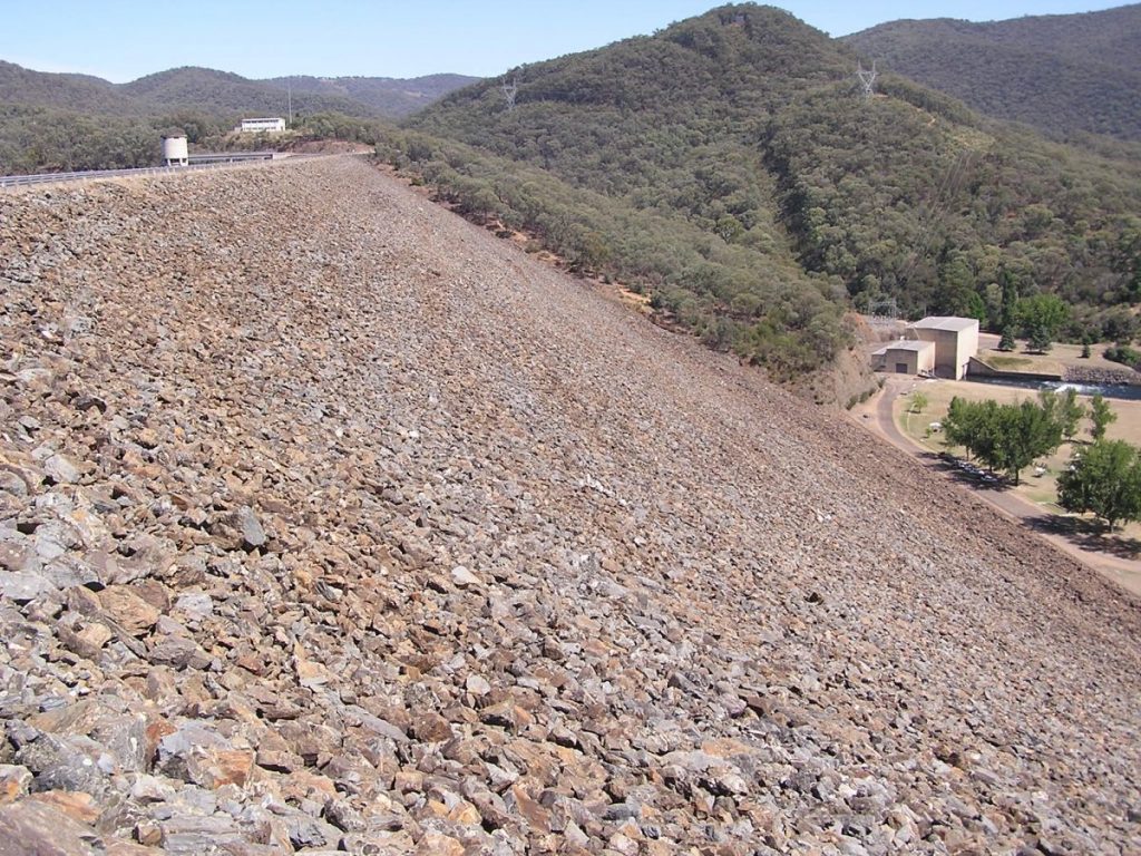 rocks on a slope by a road