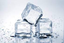 Three ice cubes melting