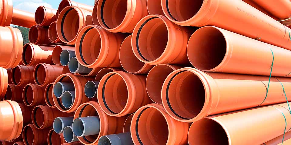 a close up photo of sewer Pipes in different sizes
