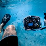 scuba diver with underwater camera